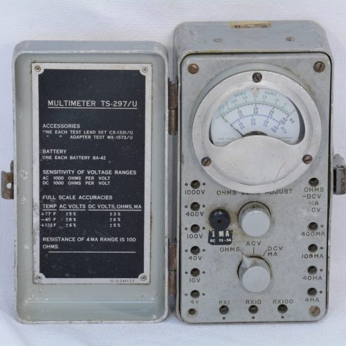 inside of an antique thruline wattmeter alarm