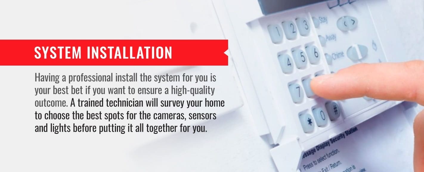 finger pressing alarm button on home system