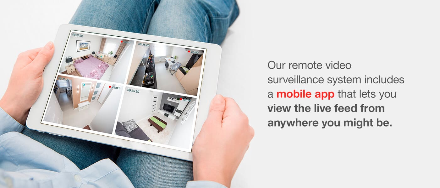 person monitoring home remotely on tablet